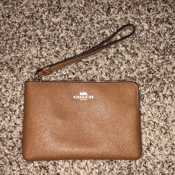 Coach Handbags - Coach Leather Wristlet in Brand New Condition